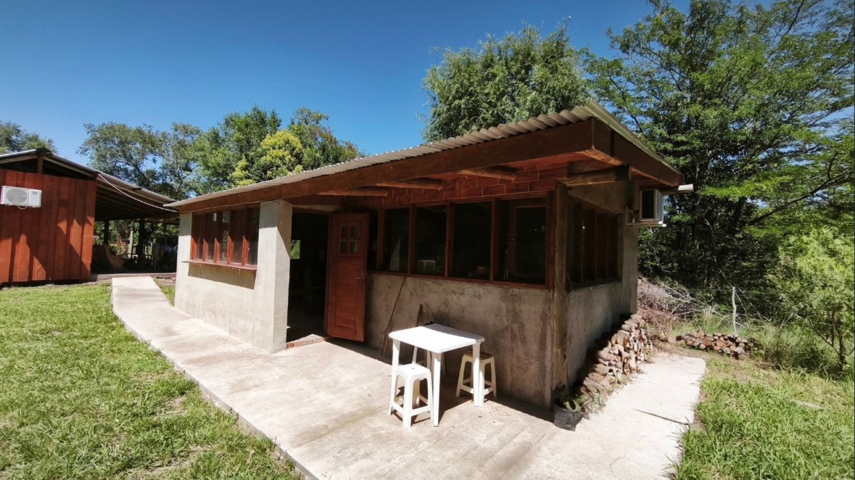 Venta de Casa Container con quincho cerrado en Villa Ciudad Parque - Calamuchita. Con escritura